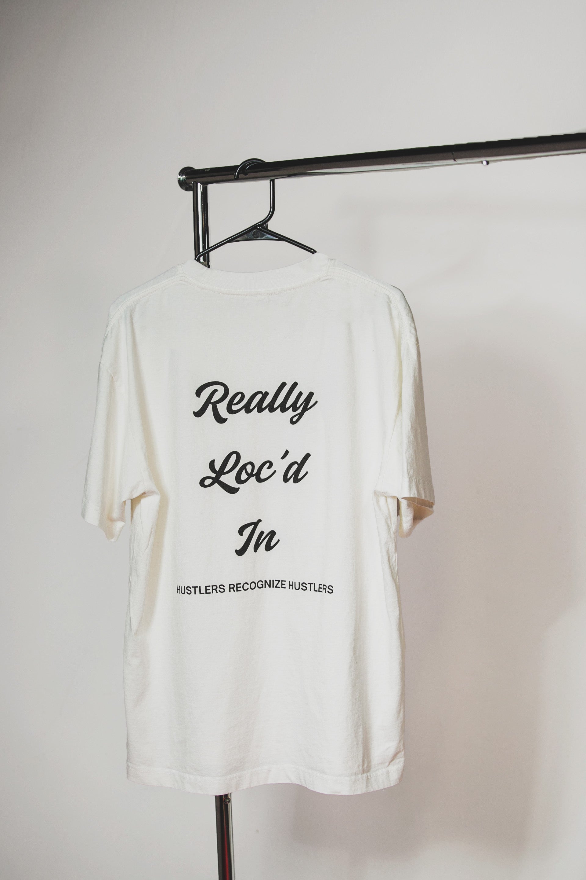 Really Loc’d In— White Signature Tee